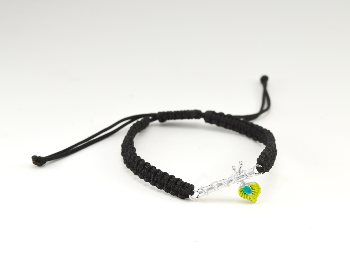 Women - Krishna ji Bansuri Hallmarked 92.5% Silver Bracelet in Black Cotton Thread