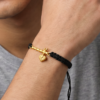 Men - Krishna ji Bansuri 24K Gold - Plated Anti Tarnished Bracelet in Black Cotton Cord