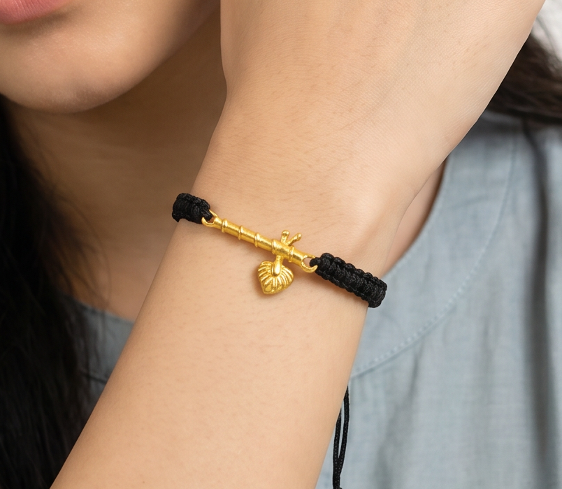 Women - Krishna ji Bansuri 24K Gold - Plated Anti Tarnished Bracelet in Black Cotton Cord