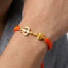 Men - Shiv Hanuman Astra 24K Gold - Plated Anti Tarnished Bracelet in Orange Cotton Cord